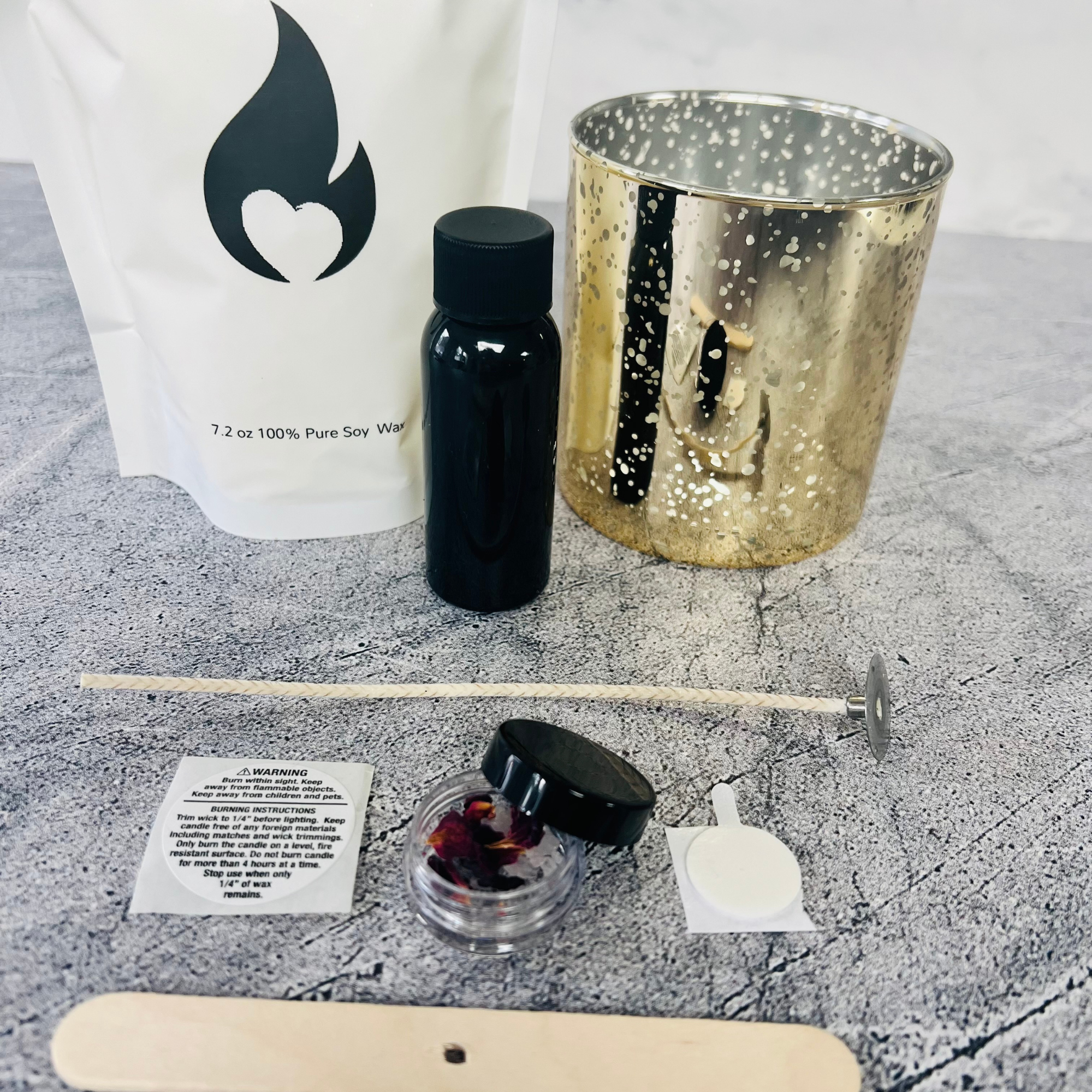 wooden wick holder warning label small plastic container with rose petals and rose quartz wick sticker cotton wick white bag with black flame logo small black bottle gold metallic vessel