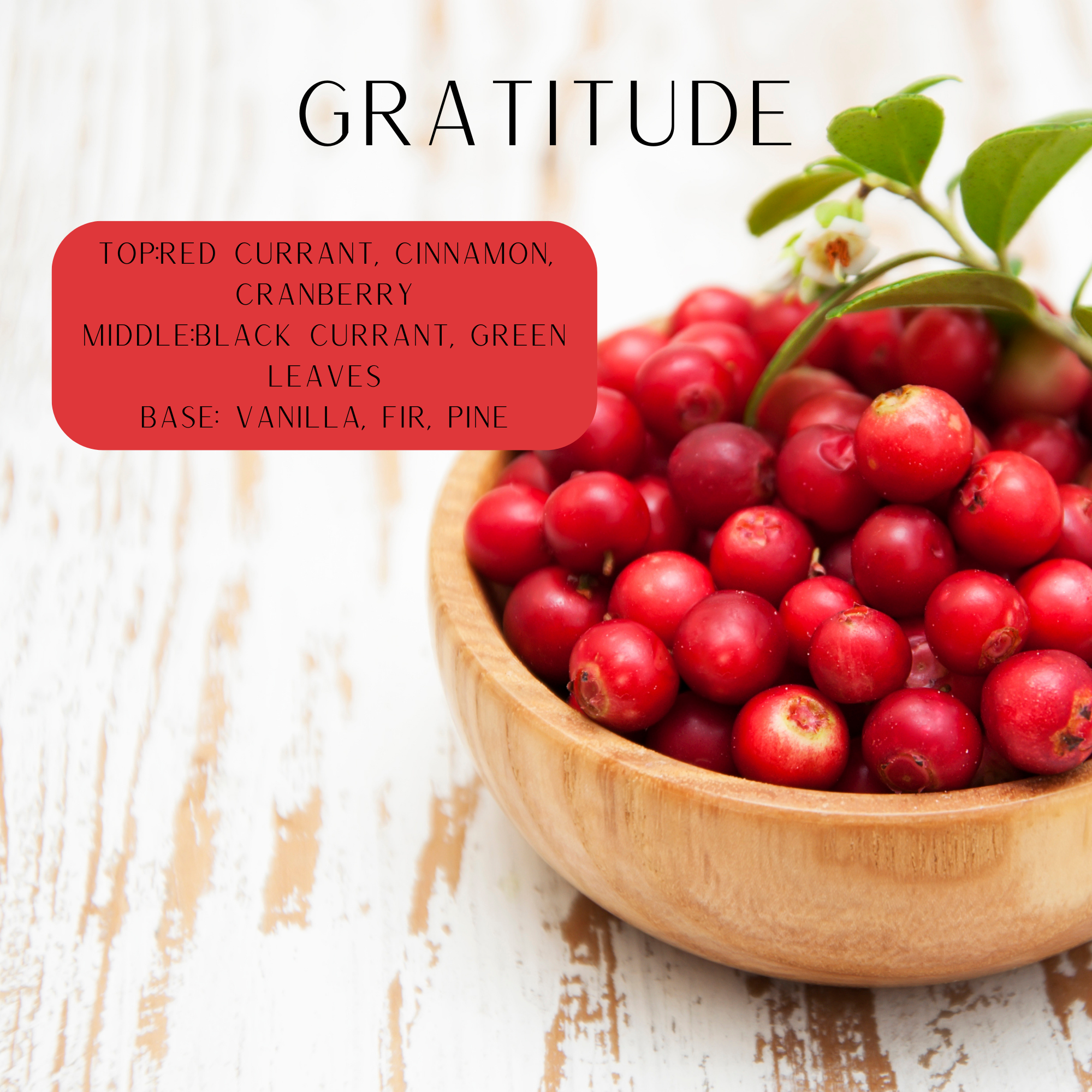 a wooden bowl filled with cranberries on a light distressed wooden plank floor says gratitude top: red currant, cinnamon, cranberry middle : black currant, green leaves base: vanilla, fir, pine